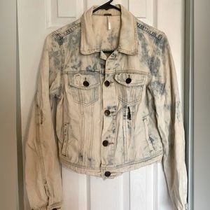 This is a Free People, denim jacket, a junior size 8, acid washed crop jacket.